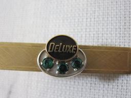 OC Tanner 1/20 12 KT GF Deluxe Tie Clip, likely emerald accents, 5.8 g