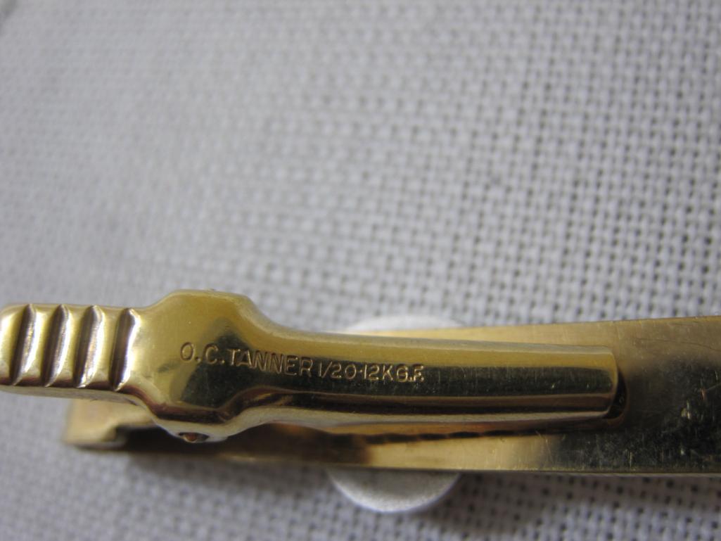 OC Tanner 1/20 12 KT GF Deluxe Tie Clip, likely emerald accents, 5.8 g