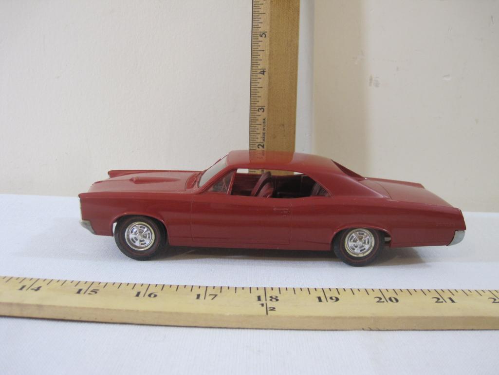 1967 Pontiac GTO 1:25 Scale Plastic Promo Model Car, red with matching interior, AS IS, 5 oz