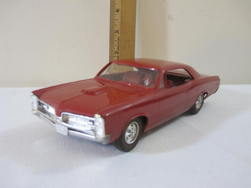 1967 Pontiac GTO 1:25 Scale Plastic Promo Model Car, red with matching interior, AS IS, 5 oz