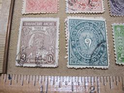 8 Foreign Indian Postage Stamps including Travancore Anchel, One Chuckram, Three Quarter Chuckram,
