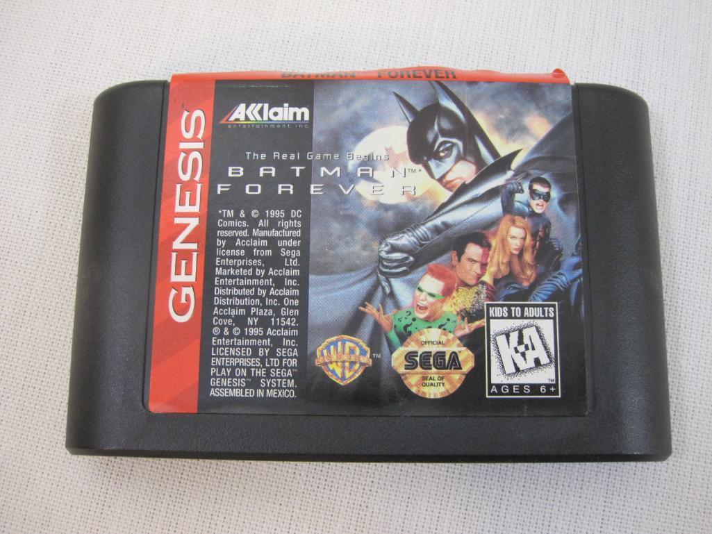 Three Vintage Sega Genesis Game Cartridges including Mazin Saga Mutant Fighter, Batman Forever, and