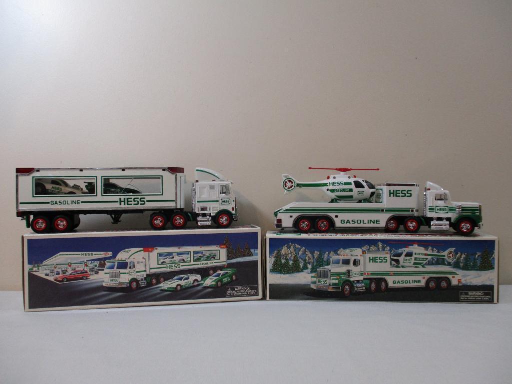 Two 1990s Hess Trucks including 1995 Toy Truck and Helicopter and 1997 Toy Truck and Racers, in