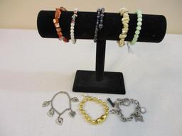 8 Bracelets including beaded, hearts with "Donna" and more, 5 oz