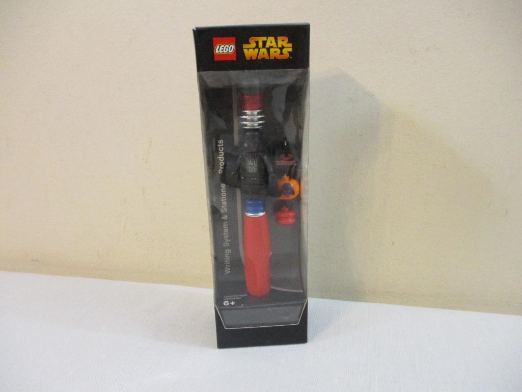 Star Wars Items including sealed Lego Star Wars Writing System, Darth Vader Pez Machine, 1999 Light