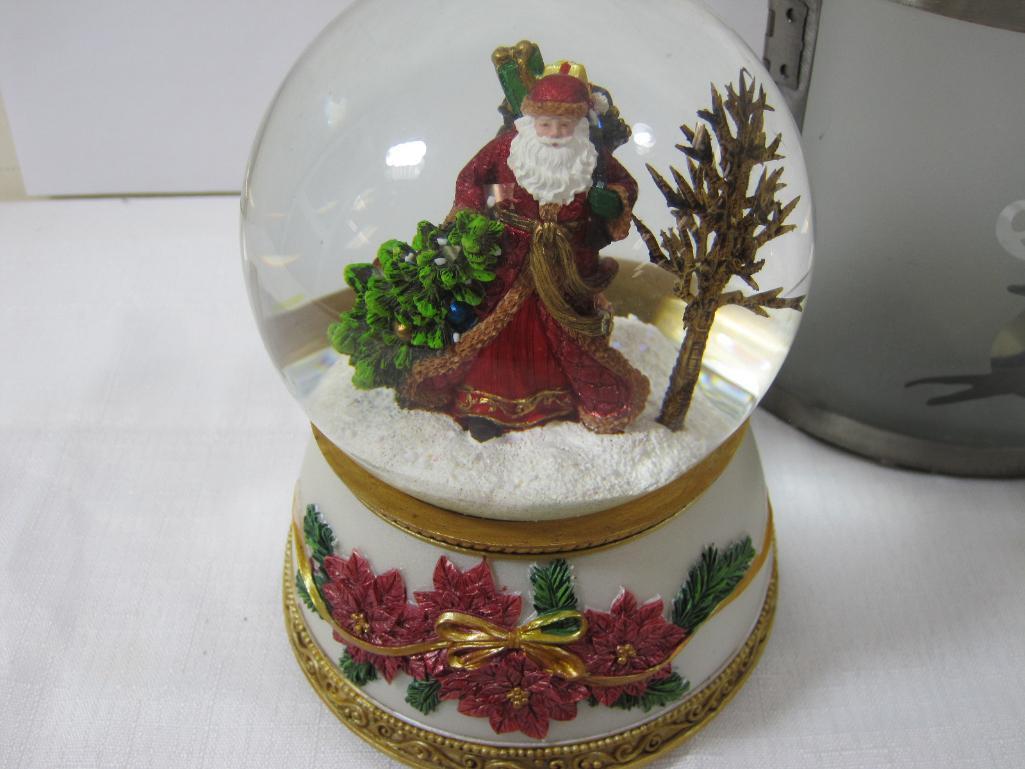 Three Table Top Christmas Decorations, 2 Snowglobes, and 1 Tea Light Candle Holder