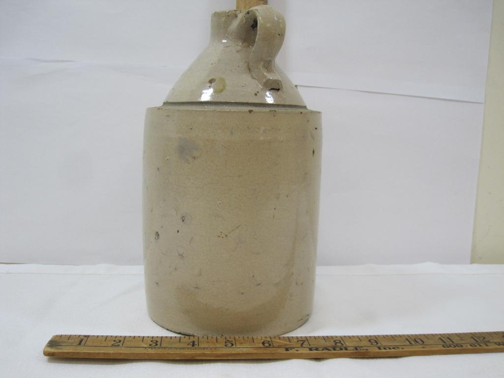 Two Stoneware Jugs, approx 9.75 inches Tall, small crack see photos