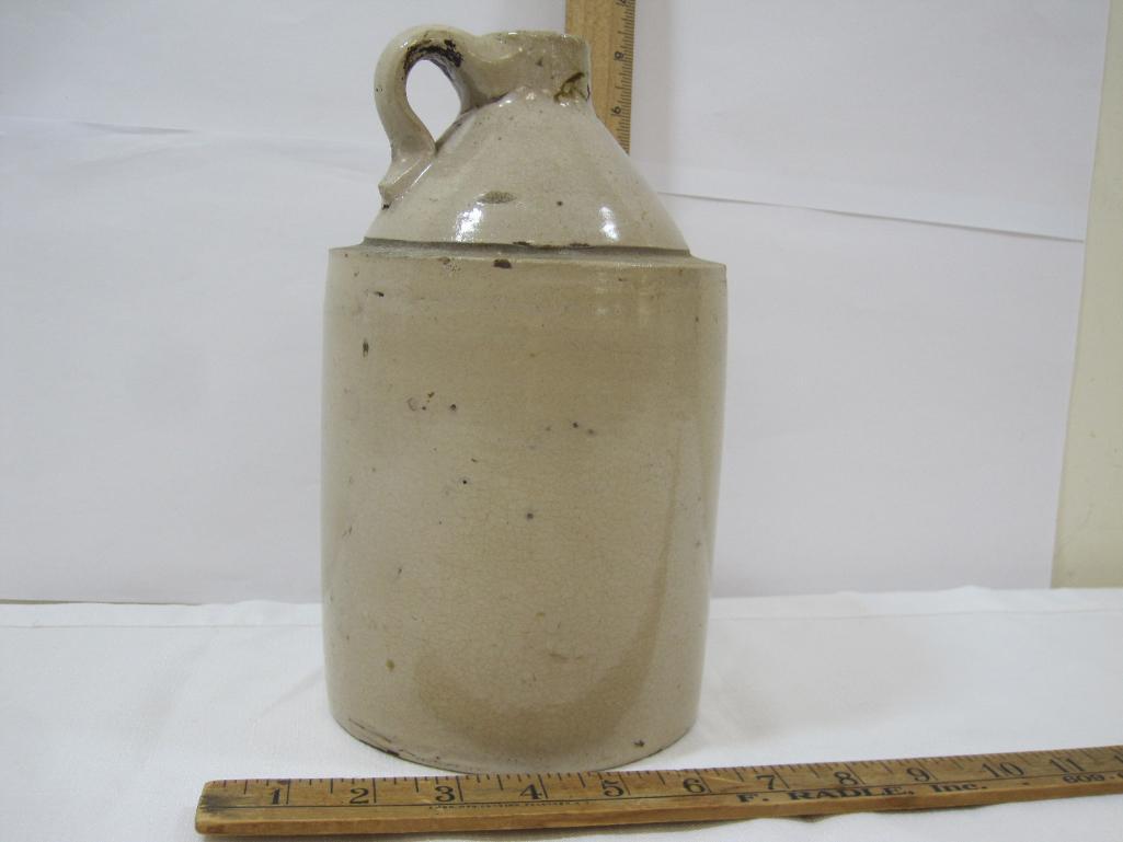 Two Stoneware Jugs, approx 9.75 inches Tall, small crack see photos