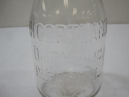 Peekskill NY 1 Quart Embossed Milk Bottle, Vancortlandt Dairy Inc