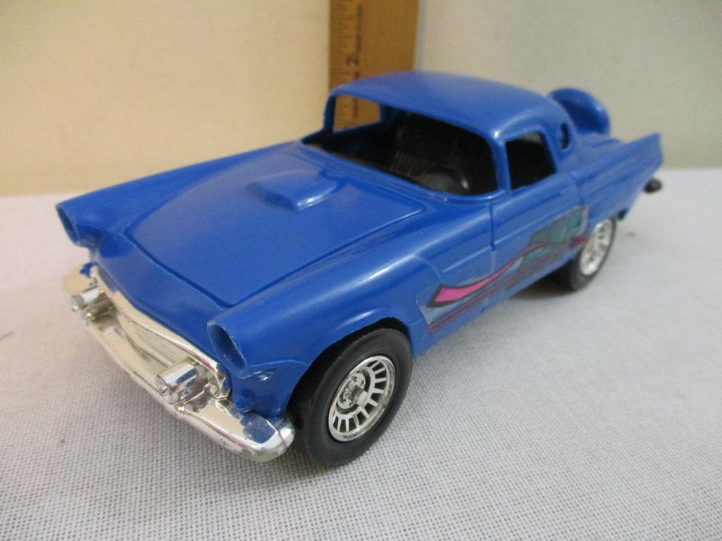 Two Plastic Tootsie Toy Cars: 1956 Ford T-Bird and red truck, 7 oz