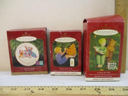 Three Winnie the Pooh Hallmark Keepsake Ornaments: Playing with Pooh, A Story for Pooh, and Gift of