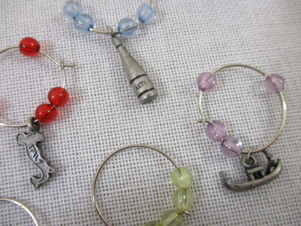 Three Pins and Assorted Wine Glass Charms including Precious Moments, Penzey Kind Heart and more, 3