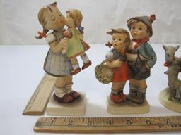 Four Hummel Figurines, Girl with Doll, Shepard Boy with Lambsm Girl with Geese and Kids with Basket