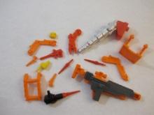 Assorted Transformer Orange, Yellow and Red Parts and Pieces, 4 oz