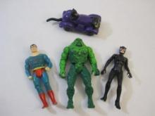 Four DC Action Figures and Toys including Superman, Swamp Thing and Catwoman,