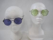 Metal Framed Sunglasses in Gold and Black with Light Green and Purple Lenses