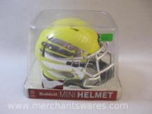 Riddell Mini Football Helmet NCAA Oregon Liquid Lightning, new in packaging, 9 oz