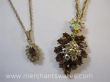 Two Gold Tone Necklaces with Pendants