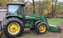 John Deere 2550 4 WD tractor (7314 hrs showing) with bucket-bush hog type mower NOT INCLUDED