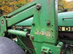 John Deere 2550 4 WD tractor (7314 hrs showing) with bucket-bush hog type mower NOT INCLUDED