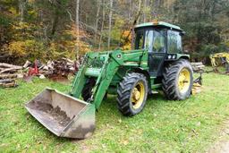 John Deere 2550 4 WD tractor (7314 hrs showing) with bucket-bush hog type mower NOT INCLUDED