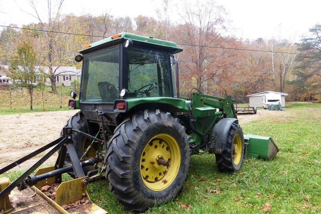 John Deere 2550 4 WD tractor (7314 hrs showing) with bucket-bush hog type mower NOT INCLUDED