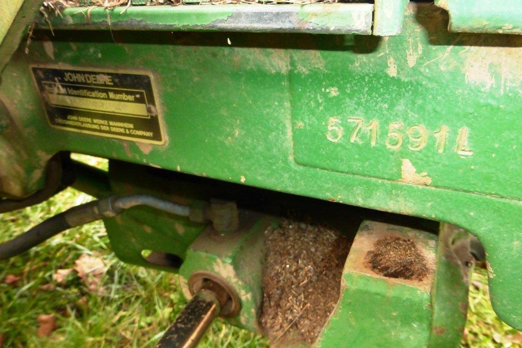 John Deere 2550 4 WD tractor (7314 hrs showing) with bucket-bush hog type mower NOT INCLUDED