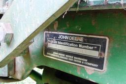 John Deere 2550 4 WD tractor (7314 hrs showing) with bucket-bush hog type mower NOT INCLUDED