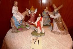 Assortment of handmade ceramic religious figures