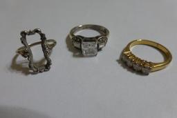 Three rings, one has no set, gold color is made in Korea, approx. size 6-7