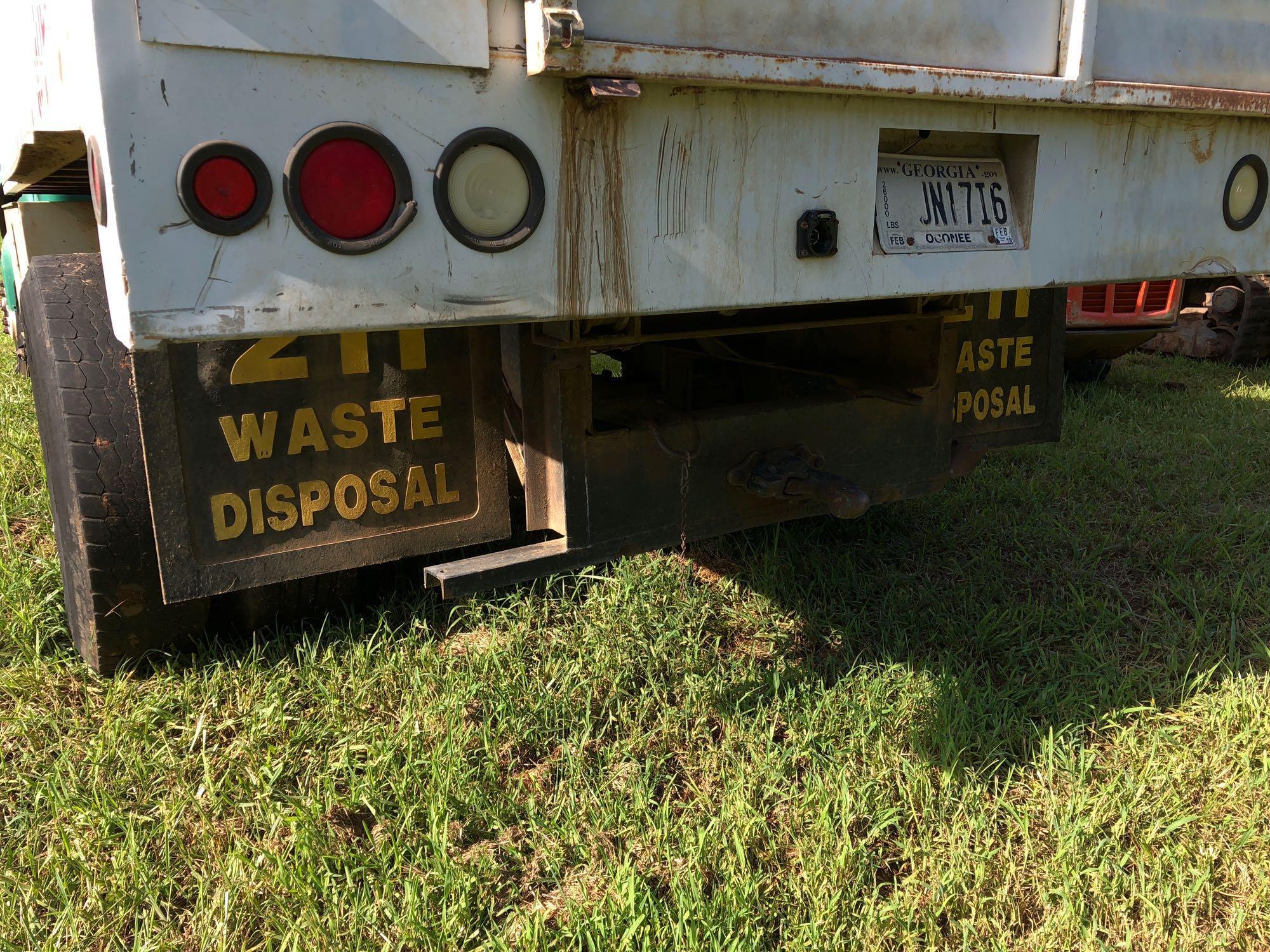 INTERNATIONAL 4700 CHIPPER DUMP TRUCK