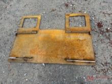 WALK THROUGH SKID STEER BACKING PLATE