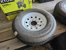 2079 - ABSOLUTE - ST235/80R16 TIRES AND 8 LUG RIM