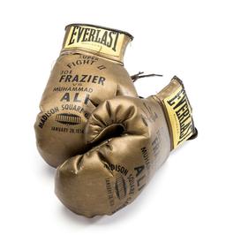 A pair of souvenir 'golden' gloves for the Joe Frazier v Muhammad Ali Fight