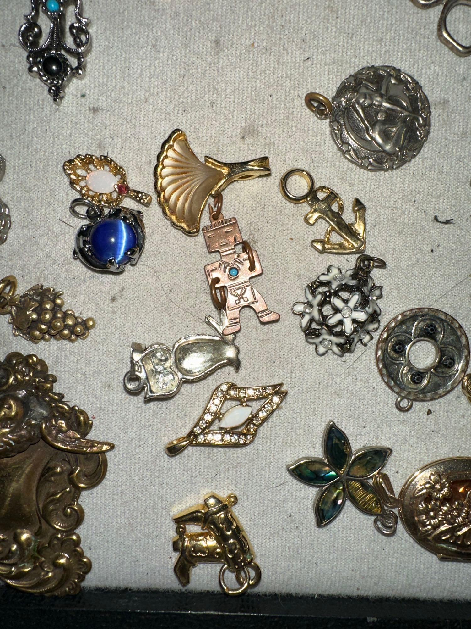 28 Assortment of Charms and Pendants