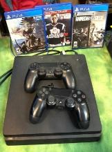 Playstation 4 (PS4) Console, 2 Wireless Controllers and 3 Video Games- WORKS