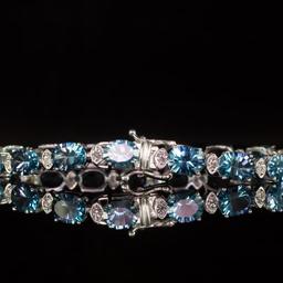 14K Gold 22.68ct Blue Topaz 0.80ct Diamond Bracelet