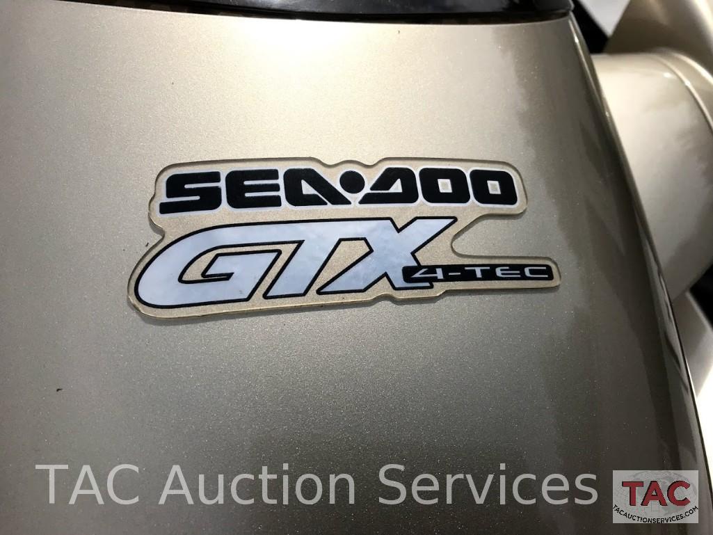 Two 2004 Sea-Doo/BRP GTX (4-Tec White/Gold and Wakeboard Edition Red/Silver)