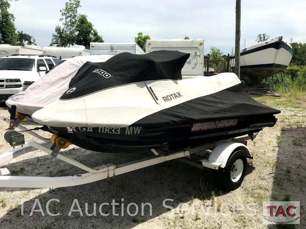 Two 2004 Sea-Doo/BRP GTX (4-Tec White/Gold and Wakeboard Edition Red/Silver)