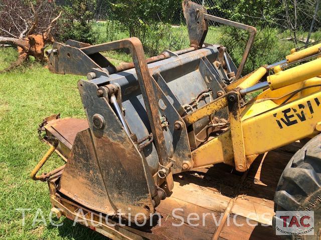 2001 New Holland 675E 4WD Loader Backhoe with 1995 Better Built 25 foot Pintle Hitch Tag A Long