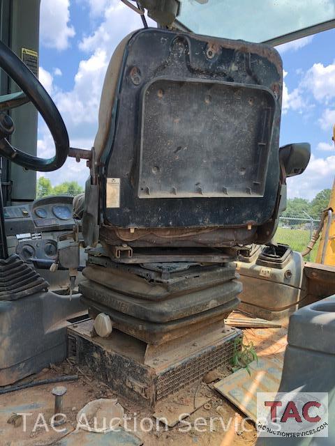 2001 New Holland 675E 4WD Loader Backhoe with 1995 Better Built 25 foot Pintle Hitch Tag A Long