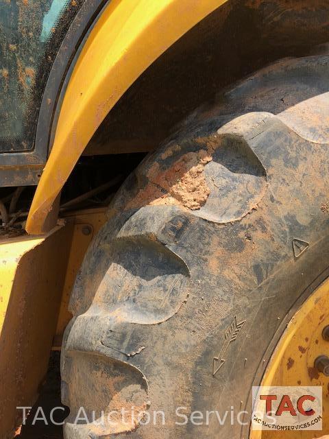 2001 New Holland 675E 4WD Loader Backhoe with 1995 Better Built 25 foot Pintle Hitch Tag A Long