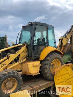 2001 New Holland 675E 4WD Loader Backhoe with 1995 Better Built 25 foot Pintle Hitch Tag A Long