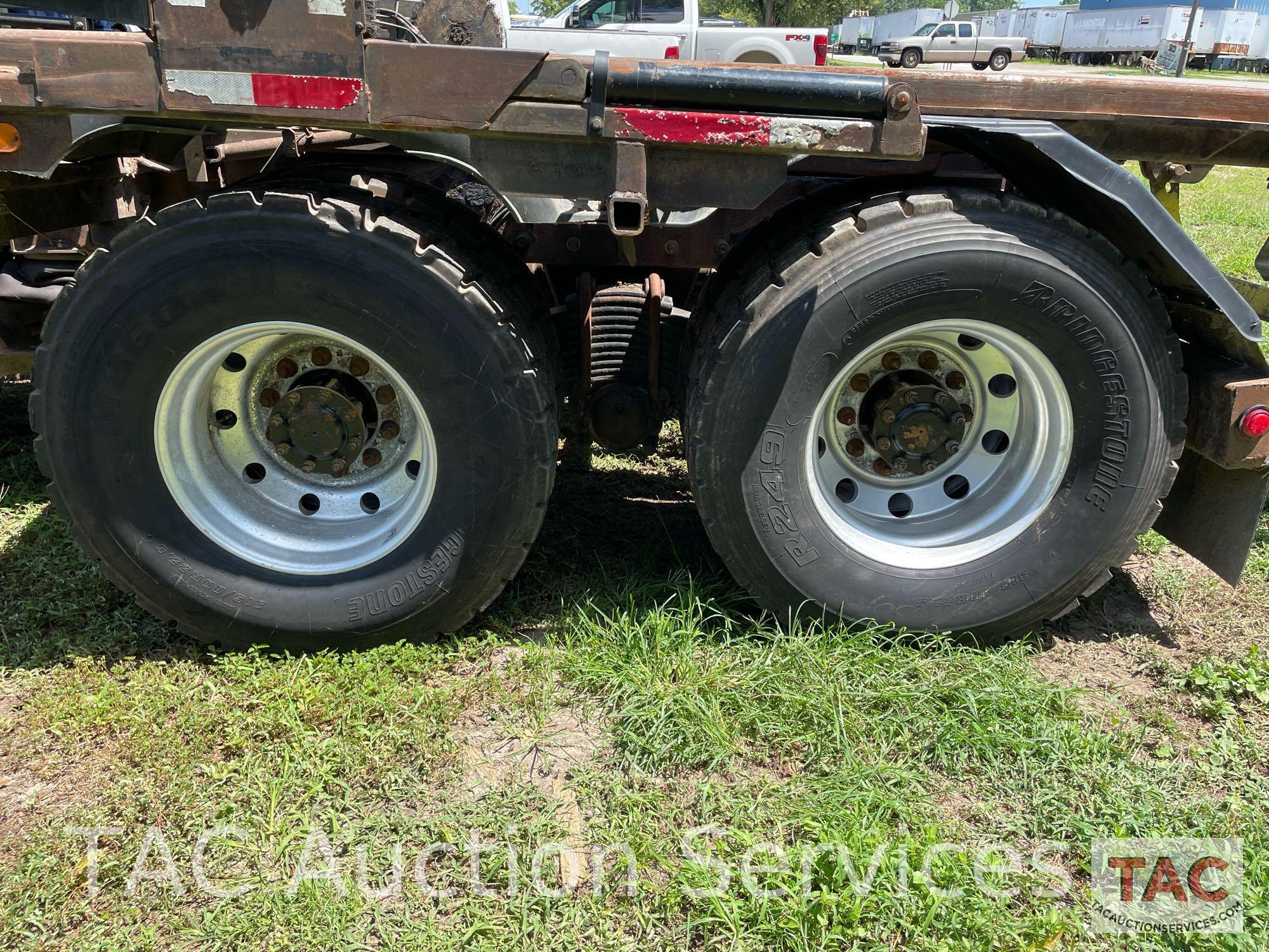 2003 Mack CV713 Roll Off Truck