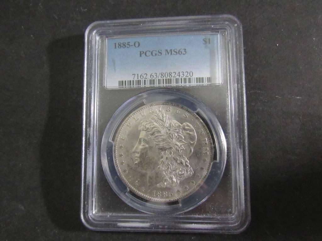 1885 O MORGAN DOLLAR PCGS MS-63 (Est: $65)