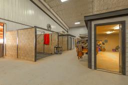Tract2: 125' x 250' Indoor Arena, 44 stalls, 4 apartments ALL UNDER ONE ROOF on 13.4 acres