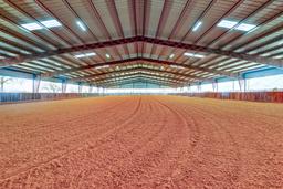 Tract2: 125' x 250' Indoor Arena, 44 stalls, 4 apartments ALL UNDER ONE ROOF on 13.4 acres