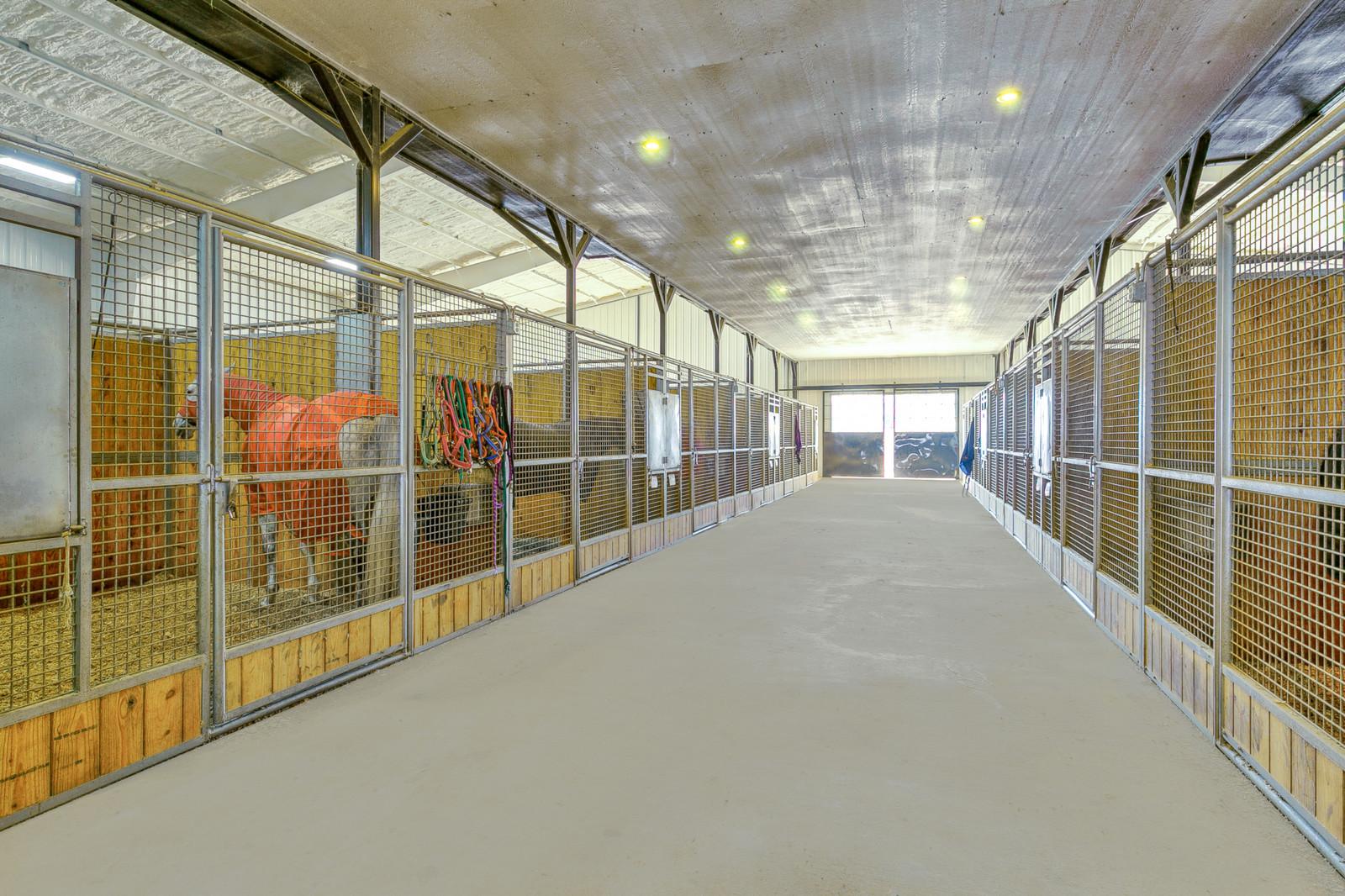 Tract2: 125' x 250' Indoor Arena, 44 stalls, 4 apartments ALL UNDER ONE ROOF on 13.4 acres