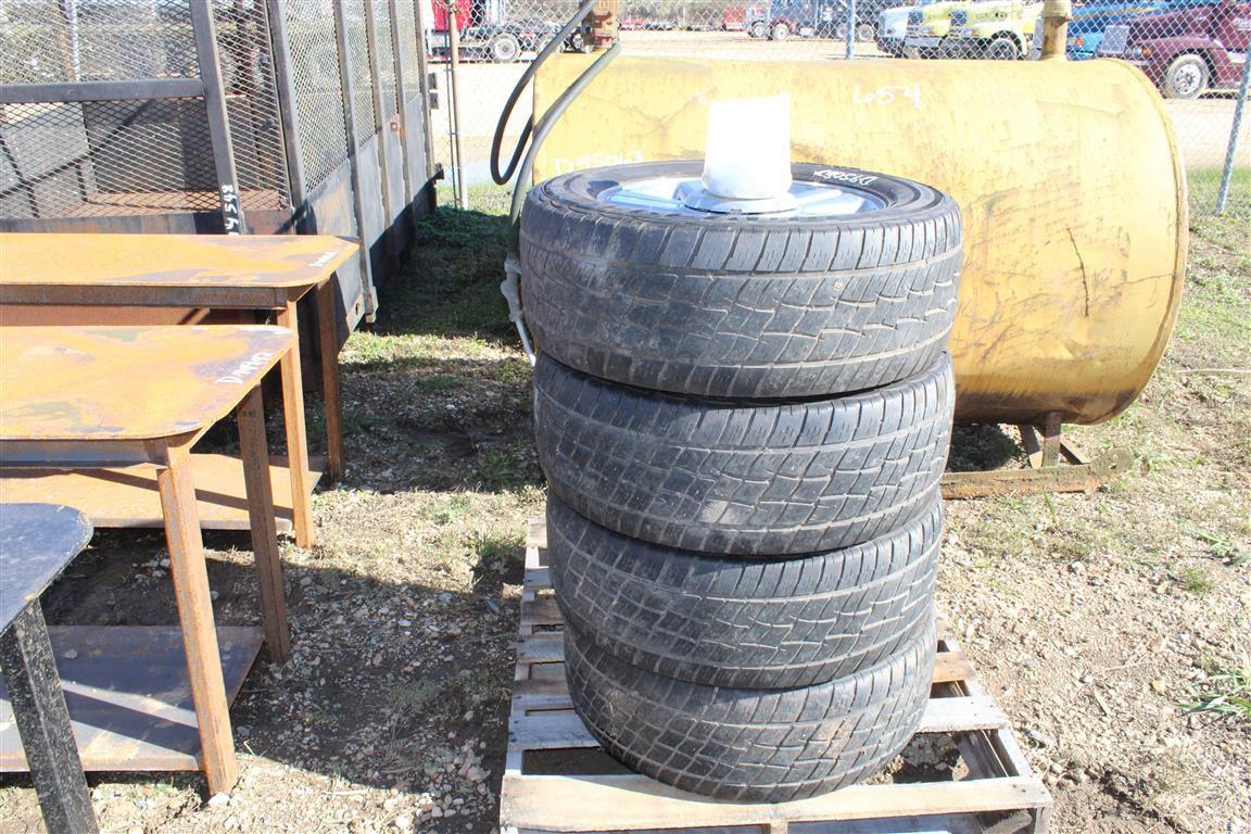 PALLET W/ (4) COOPER 265/60R18 TIRES & RIMS . ~