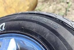 PALLET W/ (4) COOPER 265/60R18 TIRES & RIMS . ~